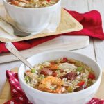 Conecuh sausage and seafood gumbo in a white bowl
